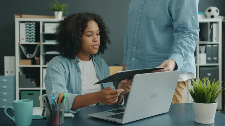 Illustrative stock photo: office work at a laptop